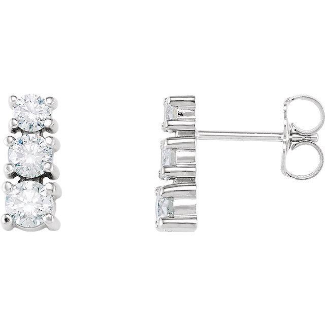 1,5 ct drie-stenen diamanten oorknopjes 14k witgoud - harrychadent.nl