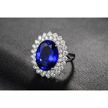 Afbeelding in Gallery-weergave laden, 1,85 karaat ovaal geslepen blauwe tanzaniet en diamanten jubileumring
