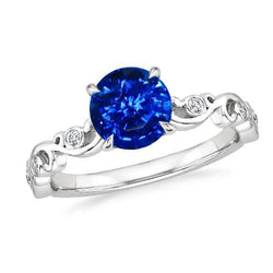 1.60 ct blauwe ronde saffier en diamanten ring