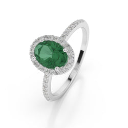 1.85 ct ovaal geslepen groene smaragd met diamanten trouwring