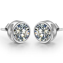 2 karaats diamanten oorknopjes wit goud 14k