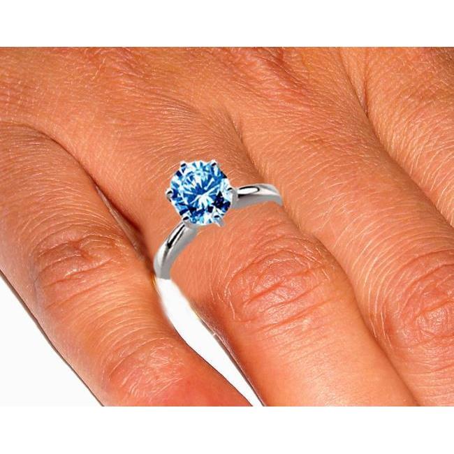 2 kt blauwe diamanten verlovingsring met edelsteen witgoud