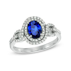 2.75 karaat witgouden ovale Ceylon saffier met ronde diamanten ring