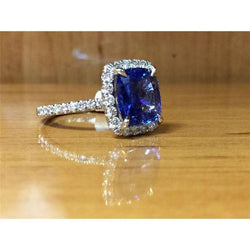 3 ct kussen Sri Lanka blauwe saffier en halo diamanten ring