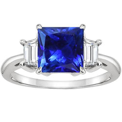 3 stenen gouden ring prinses blauwe saffier & trapezium diamanten 4 karaat