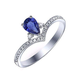 3 stenen ring met ronde diamanten accenten peer blauwe saffier 2,50 karaat