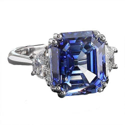 3 stenen ring trapezium diamanten met Asscher blauwe saffier 5 karaat