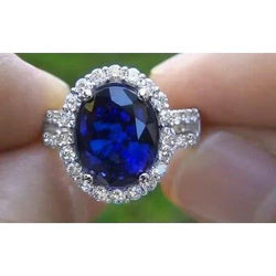 3.60 karaat ovale blauwe saffier diamanten trouwring wit goud 14K