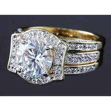 Afbeelding in Gallery-weergave laden, 4 karaats jubileum ring set ronde diamant geel goud 14K - harrychadent.nl
