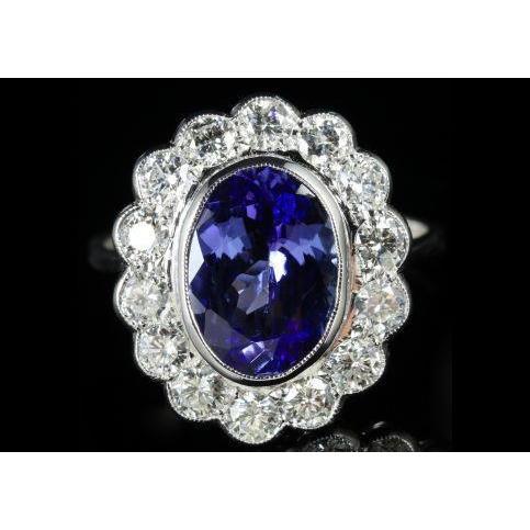 5,15 ct ovale bezel set tanzaniet met diamanten ring 14 kt witgoud - harrychadent.nl