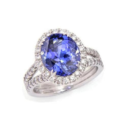 5,25 ct blauwe tanzaniet en diamanten ring 14 kt witgoud