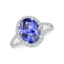 6 kt Halo Tanzaniet met diamanten ring wit goud 14k