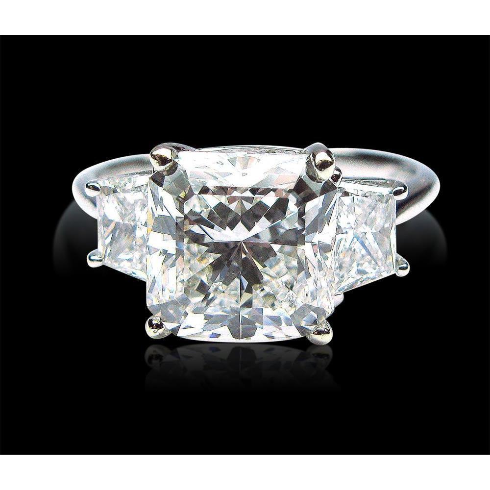 7 karaat stralende en trapeziumvormige diamanten ring met drie stenen - harrychadent.nl