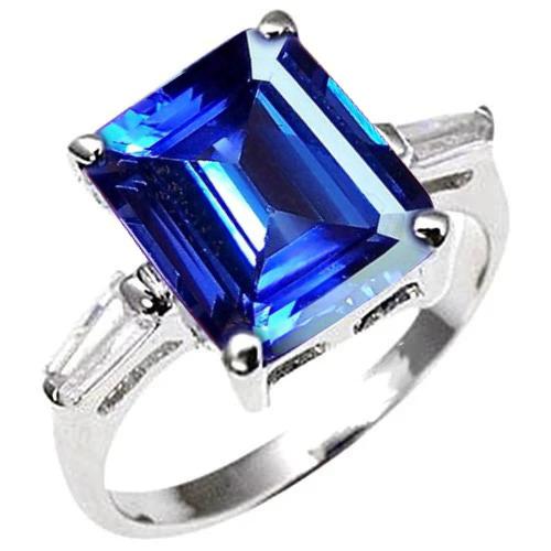 8.30 karaat Emerald Cut Tanzanite & Baguettes verlovingsring - harrychadent.nl