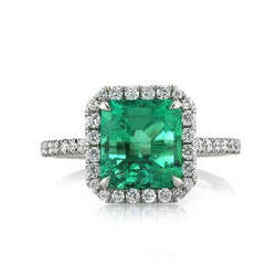 9,65 ct grote groene stralend en kleine diamanten trouwring witgoud
