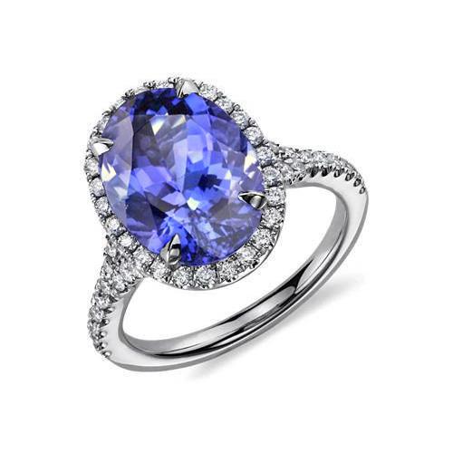 Blauw ovaal geslepen tanzaniet en diamanten ring 6,50 karaat witgoud 14K - harrychadent.nl