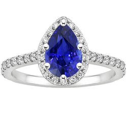 Blauwe saffier Halo verlovingsring witgouden accenten 5,50 karaat