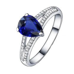 Blauwe saffier diamanten ring gespleten schacht 3 karaat witgoud 14K