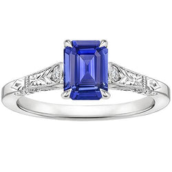Blauwe saffier en diamanten ring met 3 stenen 3,25 karaat smaragd geslepen