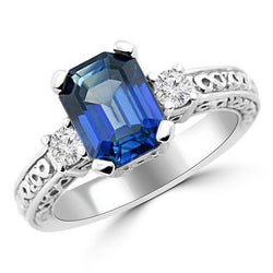 Blauwe smaragd geslepen saffier en diamanten ring met 3 stenen 2,50 karaat goud