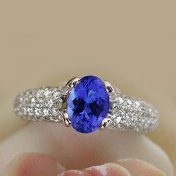 Blauwe tanzaniet edelsteen en diamanten ring 2,5 kt goud 14k