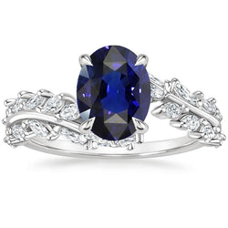 Dames gouden ring ovaal Ceylon saffier met markiezin diamanten 4 karaat