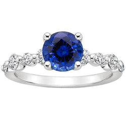 Diamanten verlovingsring met blauwe saffier in het midden 3 karaat witgoud