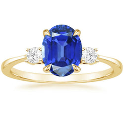 Drie stenen ovale blauwe saffier & ronde diamanten ring goud 5,50 karaat