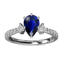 Drie stenen peer Ceylon saffier ring met diamanten accenten 3 karaat