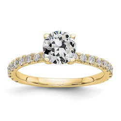 Geelgouden solitaire ring met accenten ronde oud geslepen diamant 3 karaat