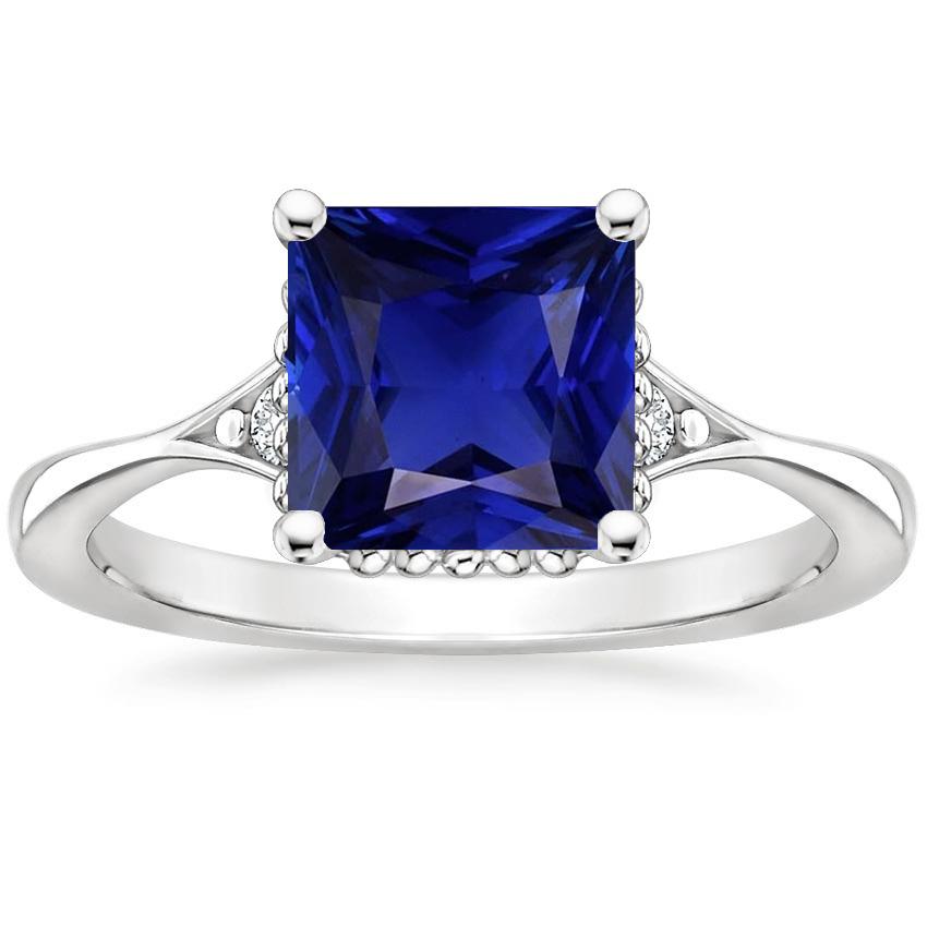 Gouden ring met 3 stenen diamant en blauwe saffier met gespleten schacht 5,25 karaat - harrychadent.nl