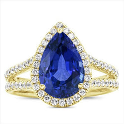 Halo Ring met uit de aarde gewonnen diamanten en Sri Lanka peervormige saffier van 8 karaat met gespleten schacht