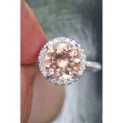 Halo Morganite en diamanten 15,50 karaats ring wit goud 14K