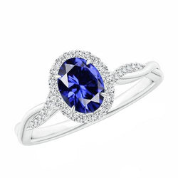 Halo-diamantring 4,25 karaat ovale blauwe saffier sprankelend wit goud