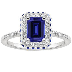 Halo-diamantring met blauwe saffieren aan de zijkant Smaragd 4,25 karaat