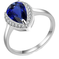 Halo diepblauwe saffierring wit goud en diamanten 3,50 karaat
