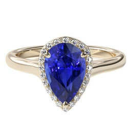 Halo verlovingsring Peer geslepen blauwe saffier en diamanten 4 karaat