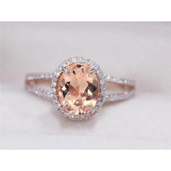 Ovaal en rond geslepen 19,75 ct Morganite met diamanten ring tweekleurig goud