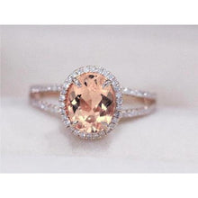 Afbeelding in Gallery-weergave laden, Ovaal en rond geslepen 19,75 ct Morganite met diamanten ring tweekleurig goud - harrychadent.nl
