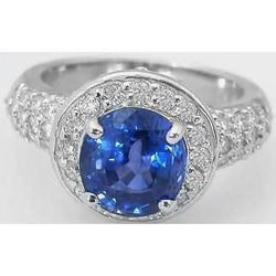 Ovaal geslepen Ceylon saffier met ronde diamanten 4 kt ring wit