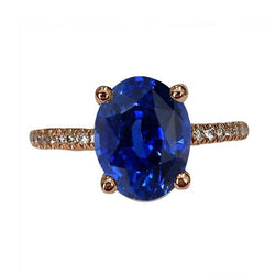 Ovale Solitaire Ring met Blauwe Saffier & Pave Set Diamanten 4,50 Karaat