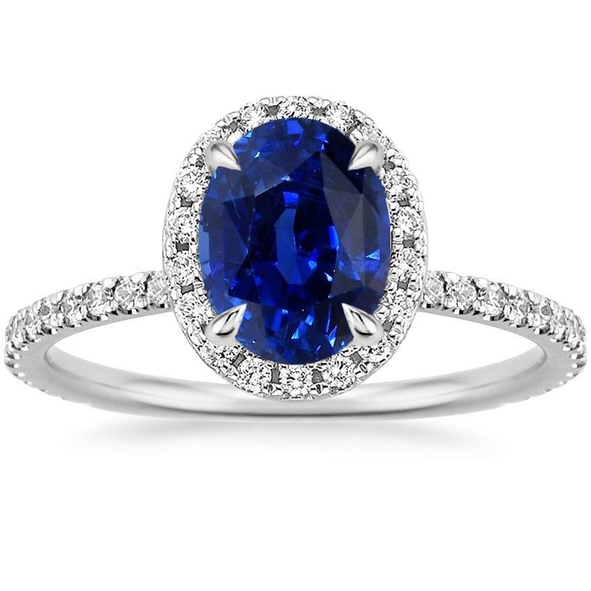 Ovale blauwe saffier Halo diamanten verlovingsring geaccentueerd 6,20 karaat - harrychadent.nl