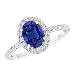 Ovale diamanten Halo ring blauwe saffier geaccentueerd wit goud 5,50 karaat