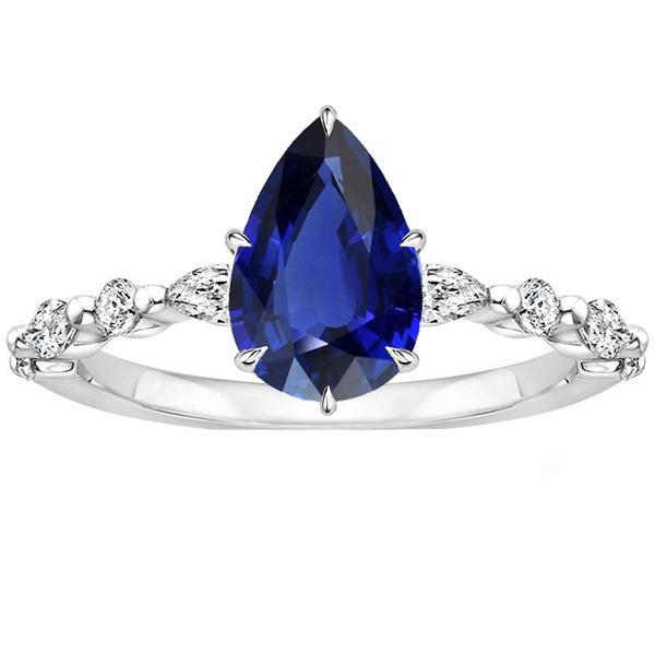 Peer Diamanten Jubileumring Met Blauwe Saffier Midden Goud 5 Karaat - harrychadent.nl