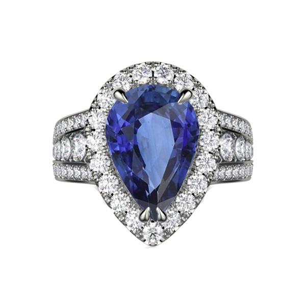 Peer Halo verlovingsring met blauwe saffier en diamanten 3 karaat - harrychadent.nl