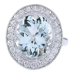 Prong Set 11 kt ronde ring met aquamarijn en diamanten wit goud 14k