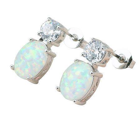 Prong Set 13 kt opaal en diamanten oorknopjes goud wit 14k - harrychadent.nl