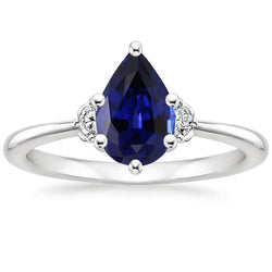 Ring met 3 stenen diamant en blauwe saffier 6,75 karaat taps toelopende schacht goud