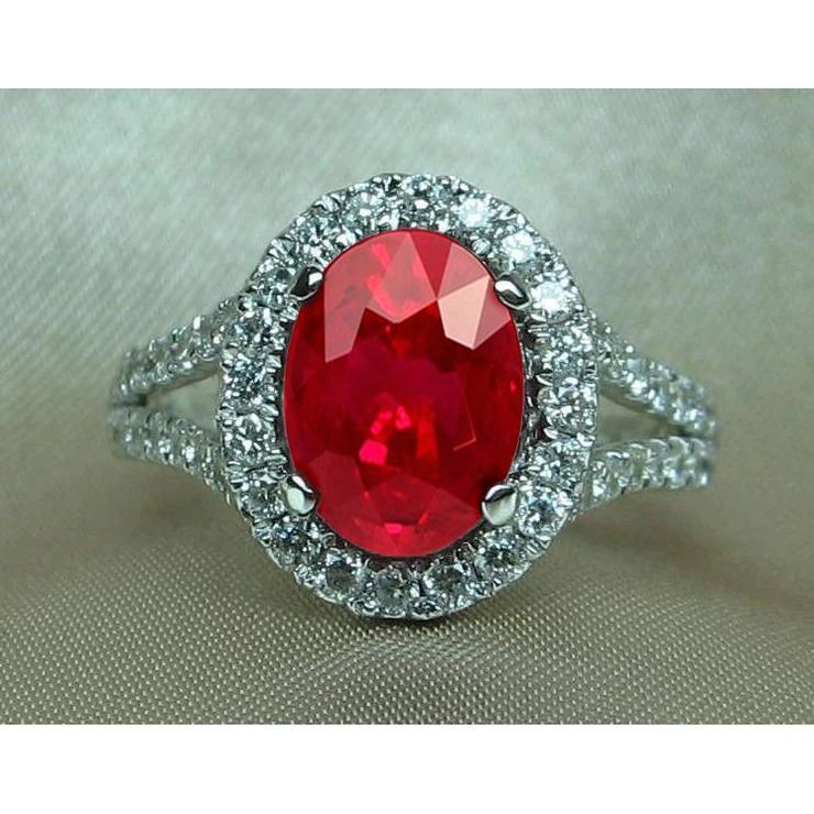 Rode ovale robijn met accenten diamanten trouwring 6,75 karaat witgoud - harrychadent.nl