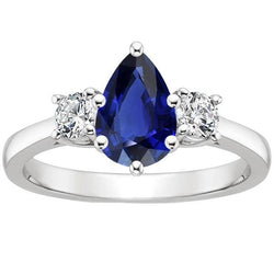 Ronde diamanten ring met 3 stenen peer geslepen Ceylon saffier 3 karaat
